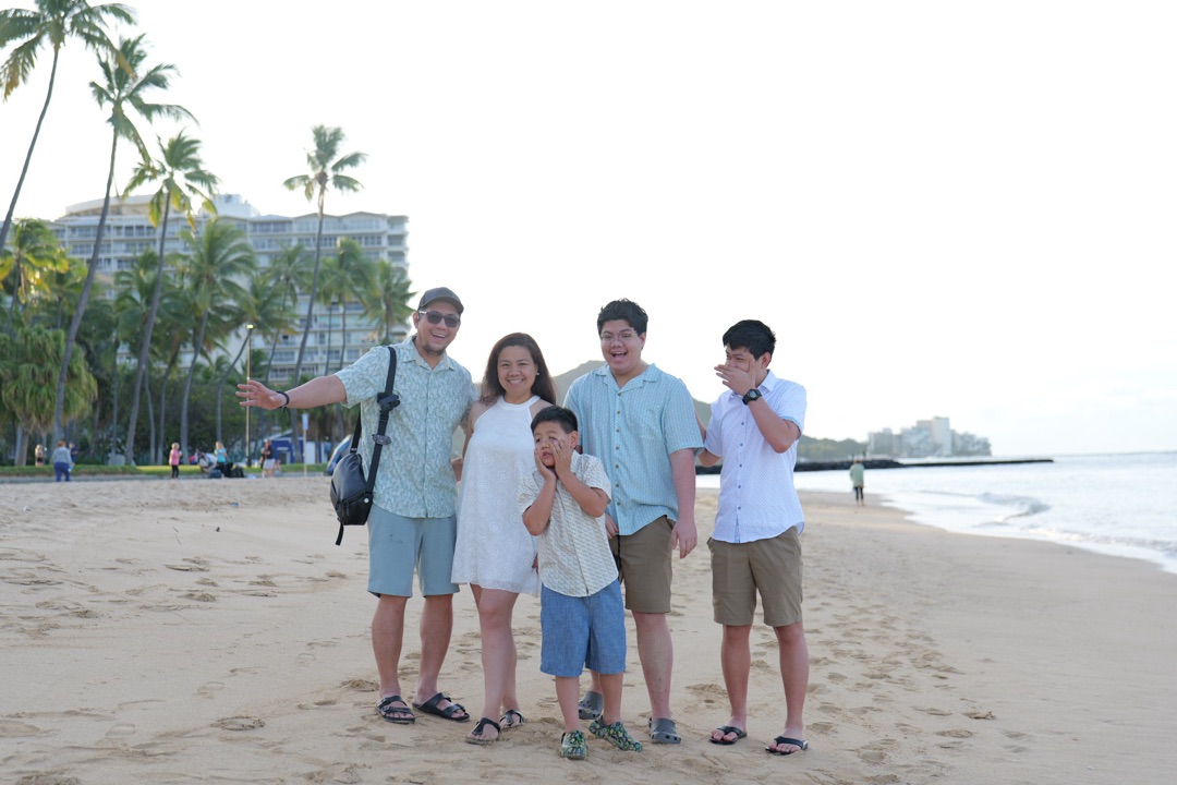 Somoza family at Waikiki Beach at sunset, Oahu Hawaii